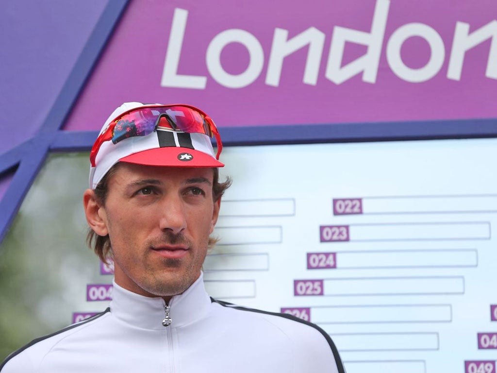 Fabian Cancellara, a four-time world time-trial champion, tumbled on a right-hand corner in the final stages of the road race