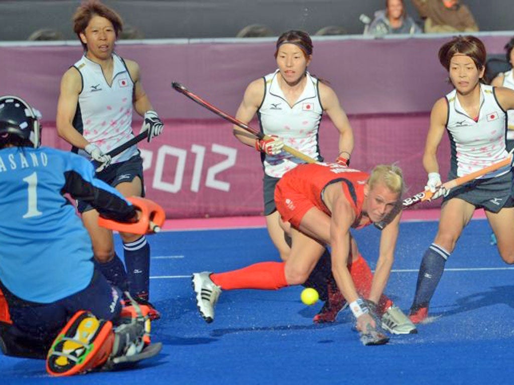 Alex Danson (centre) scores Team GB’s first goal yesterday