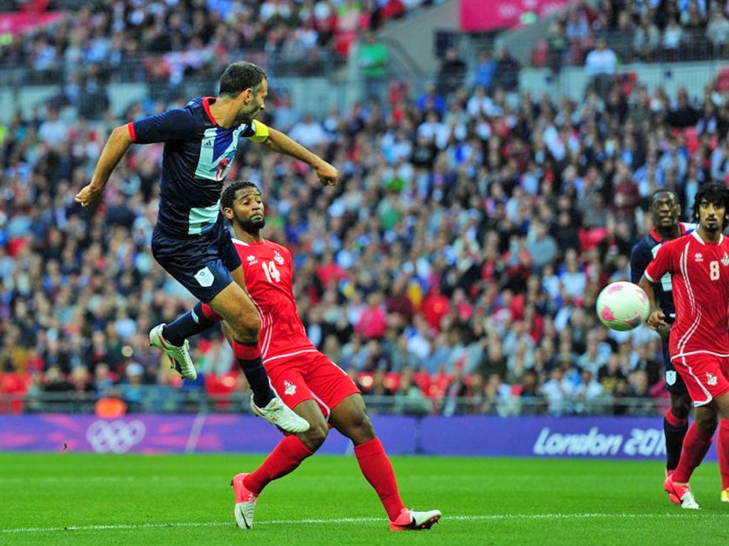 Ryan Giggs heads in Craig Bellamy’s cross at Wembley last night