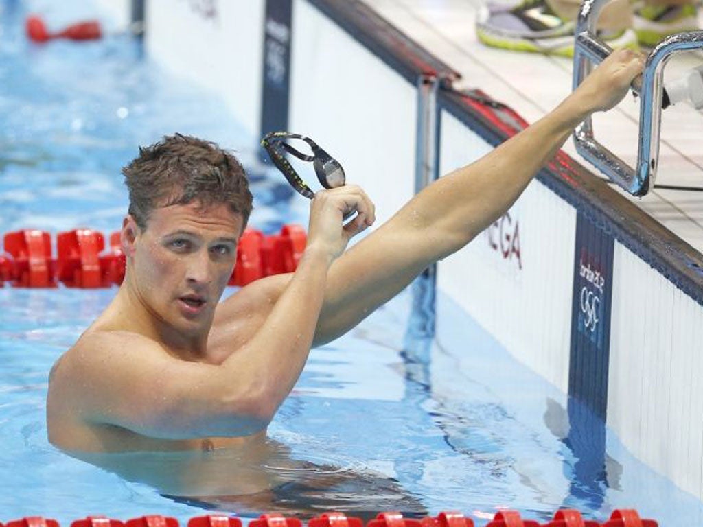 United States' Ryan Lochte reacts after his relay team's silver medal win in the men's 4x100-meter freestyle relay