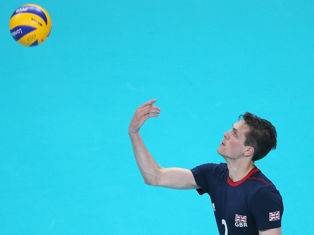 Ben Pipes of Great Britain serves the ball in the third set against Australia