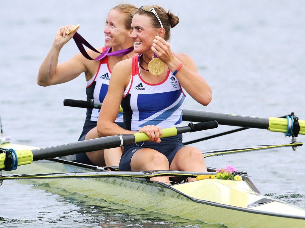 Helen Glover (left) and Heather Stanning celebrate Britain's first gold medal