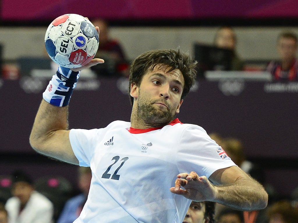 Britain's pivot Robin Garnham shoots during the men's preliminary Group A handball match Great Britain vs Argentina