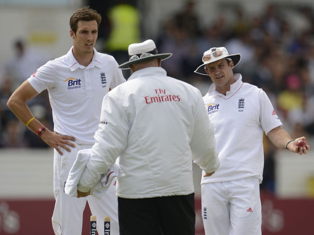 Steven Finn and Andrew Strauss contest Steve Davis' decision yesterday