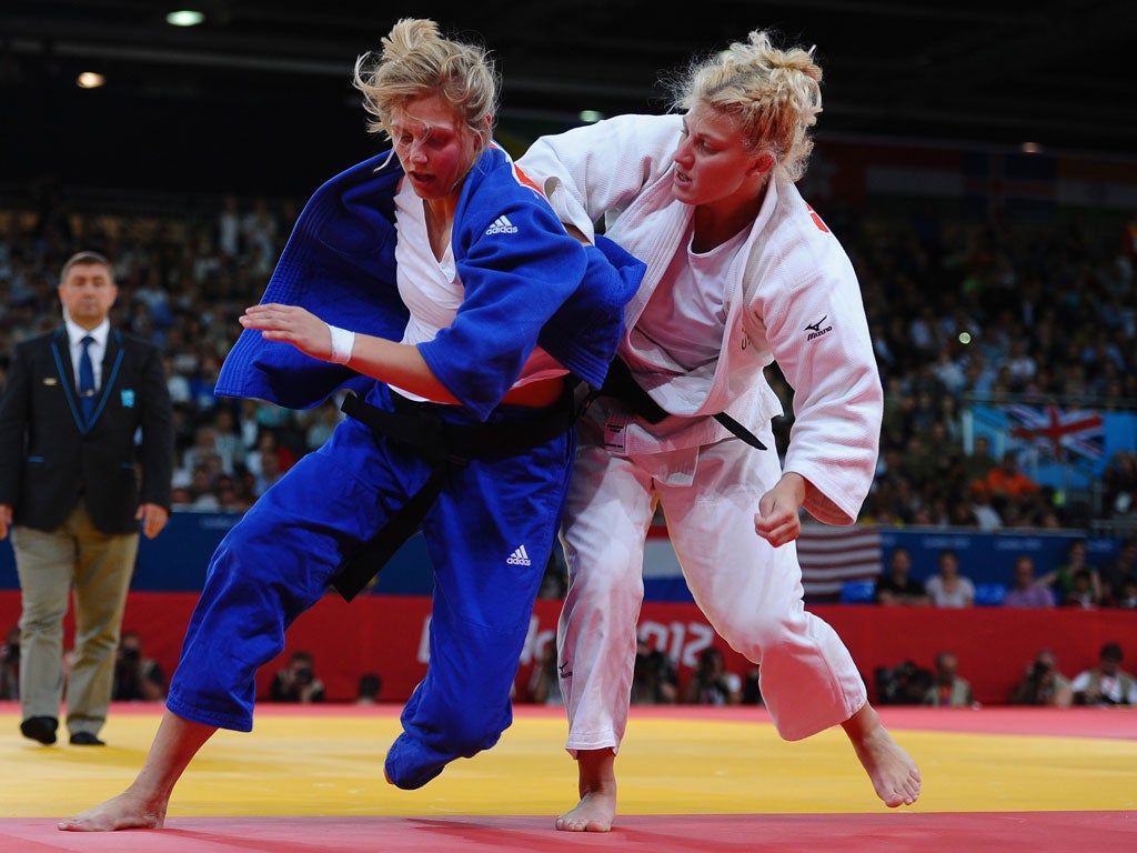 Kayla Harrison (right) during her judo career