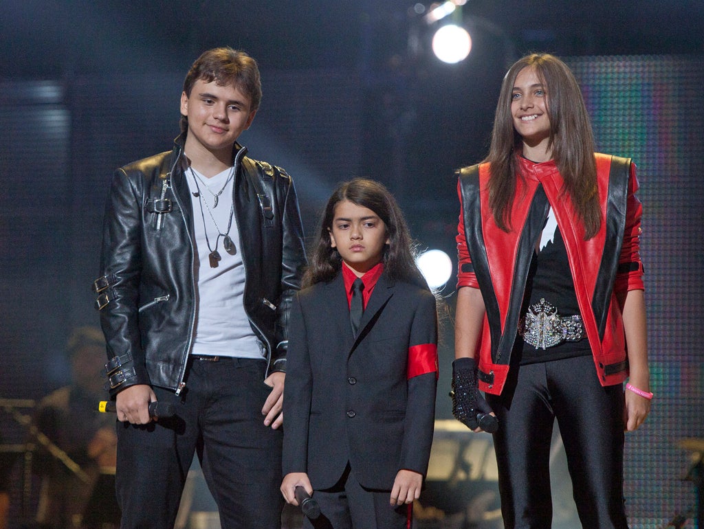 From left, Prince Jackson, Prince Michael II "Blanket" Jackson and Paris Jackson arrive on stage at the Michael Forever the Tribute Concert, at the Millennium Stadium last year