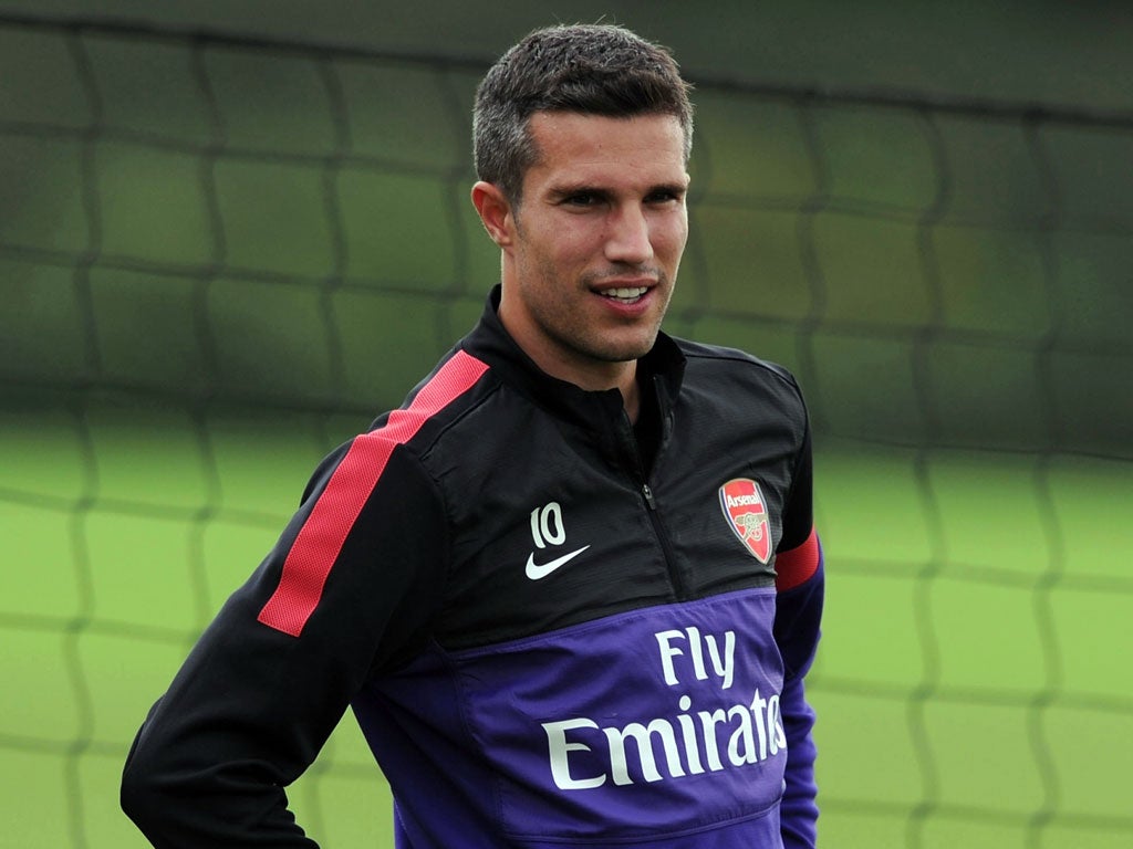 Robin van Persie joins Arsenal's training camp next week