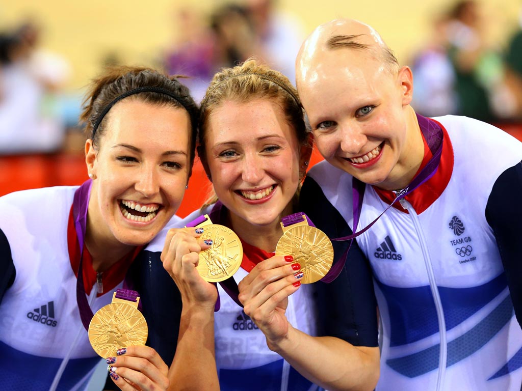 August 4, 2012: Dani King, Laura Trott, and Joanna Rowsell of Great Britain pose with their gold medals during the medal ceremony for the Women's Team Pursuit