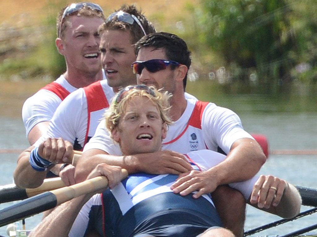 Pete Reed (second left) proposed to his girlfriend during closing ceremony