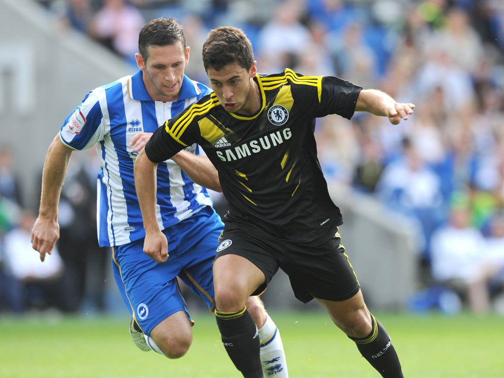 Hazard warning: New signing Eden Hazard (right) goes past Andrew Crofts