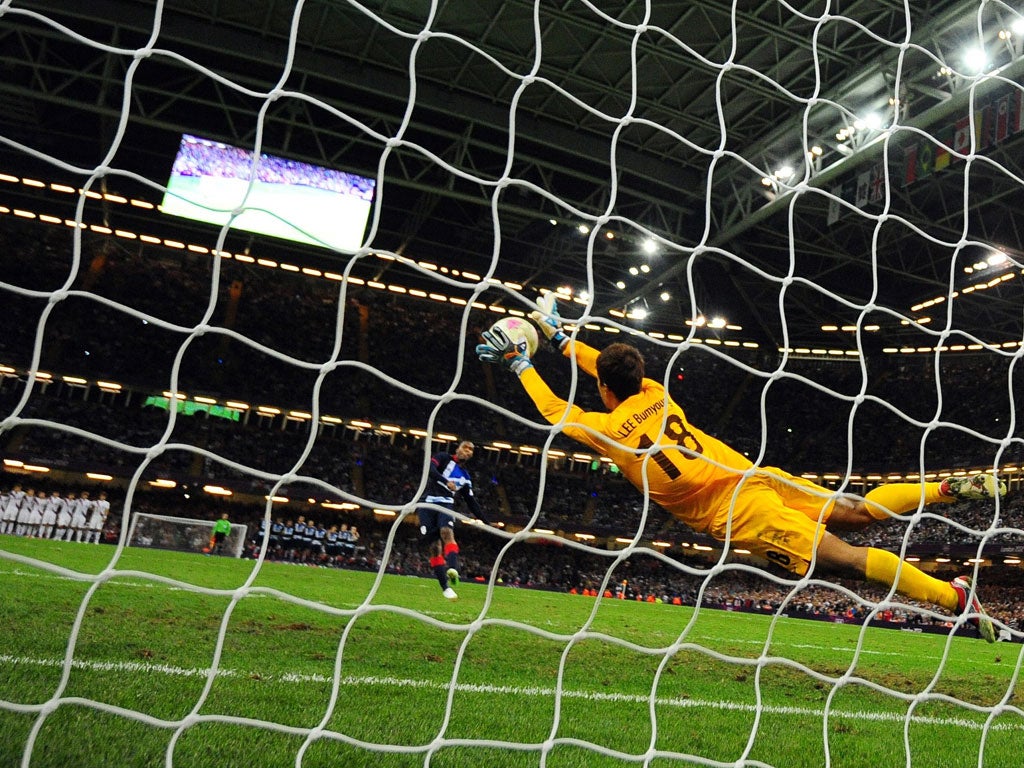 Same old story: Daniel Sturridge's penalty is saved by substitute goalkeeper Lee Bumyoung