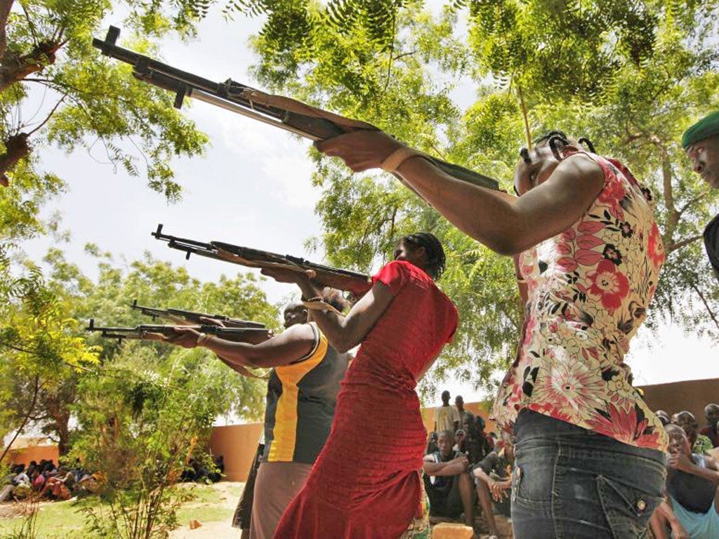 Women train in Sevare with the Front for the Liberation of the North, a militia opposed to the rebels