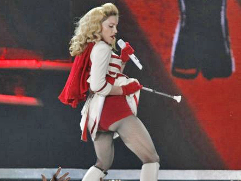 'Sorry, her career is over. She looks like a fairground stripper' says
Sir Elton John about Madonna