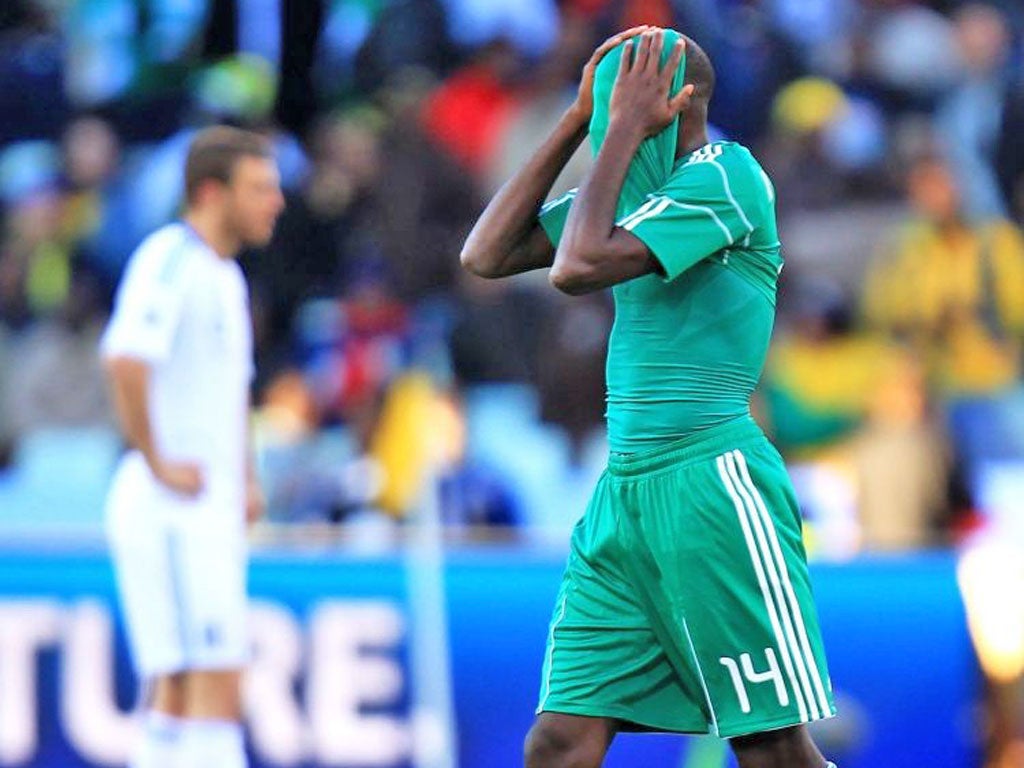 Sani Kaita, of Nigeria, is sent off in the 2010 match with Greece