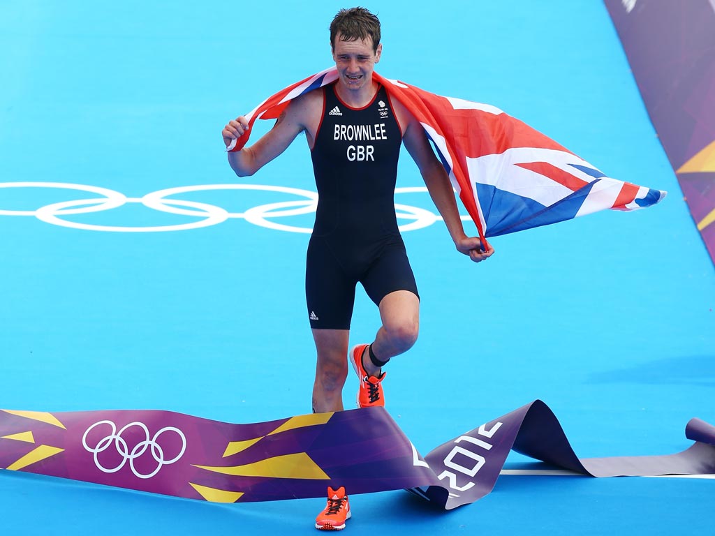 August 7, 2012: Team GB's Alistair Brownlee crosses the line in the triathlon in Hyde Park