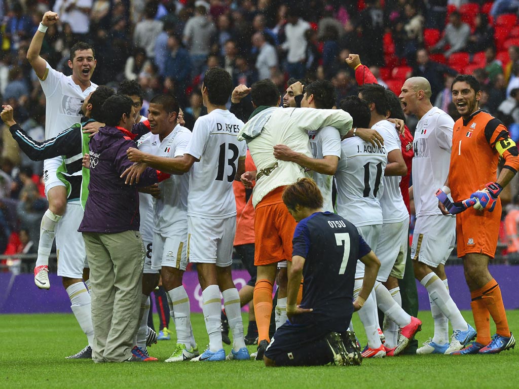 August 7, 2012: Mexico's players celebrate their victory over Japan at Wembley as they reach the football final