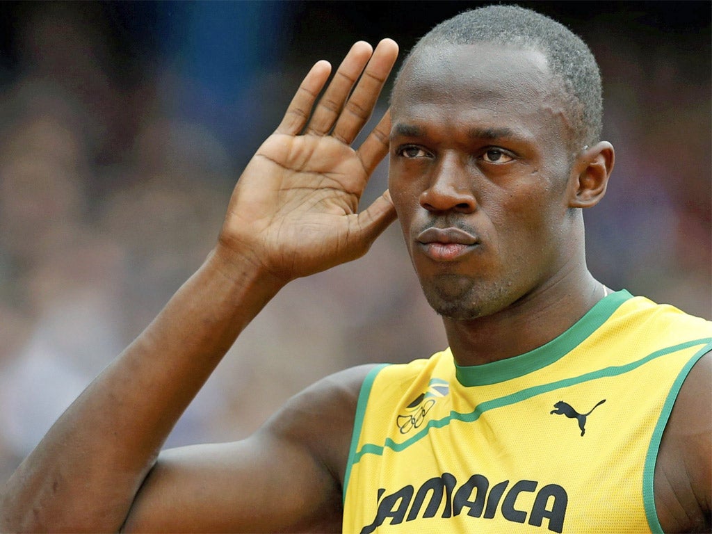 Usian Bolt cruised in his 200m heat – four qualifiers ran faster