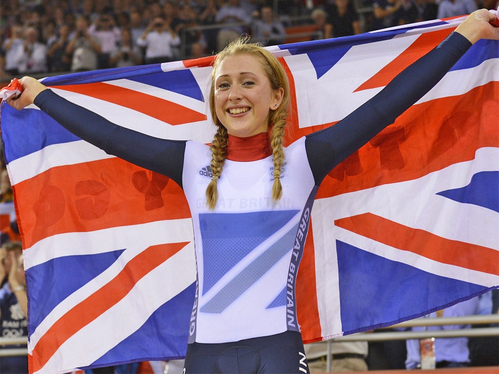 Laura Trott celebrates her gold medal winning performance in the omnium