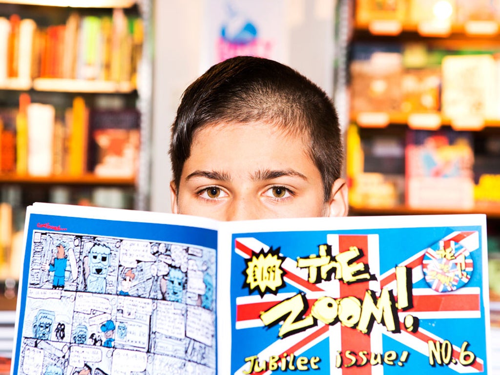 Zoom Rockman poses with issue six of his creation at Gosh! Comics in London's Soho