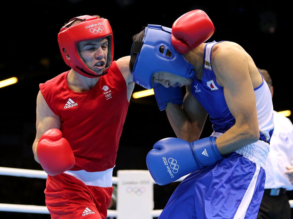 Luke Campbell eased through his bantamweight semi-final against Japan's Satoshi Shimizu 20-11 today.