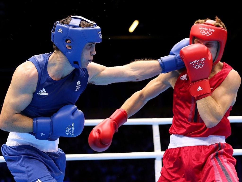 Fred Evans connects with a left on his way to victory over Taras Shelestyuk
