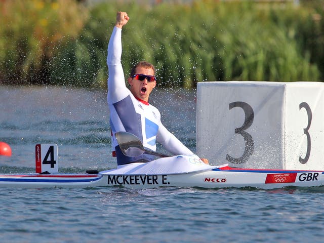 Ed McKeever celebrates after storming to gold in the 200m kayak sprint at Eton Dorney