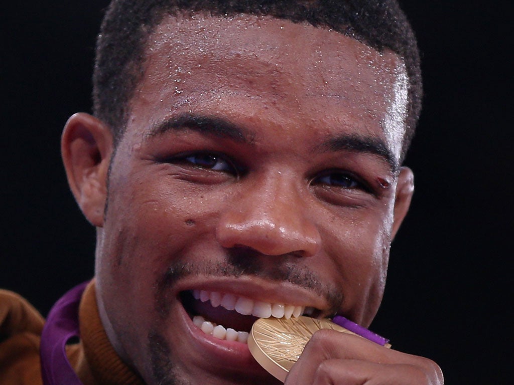 US wrestler Jordan Burroughs won gold in the 74kg freestyle but also left the Games $250,000 (£160,000) richer