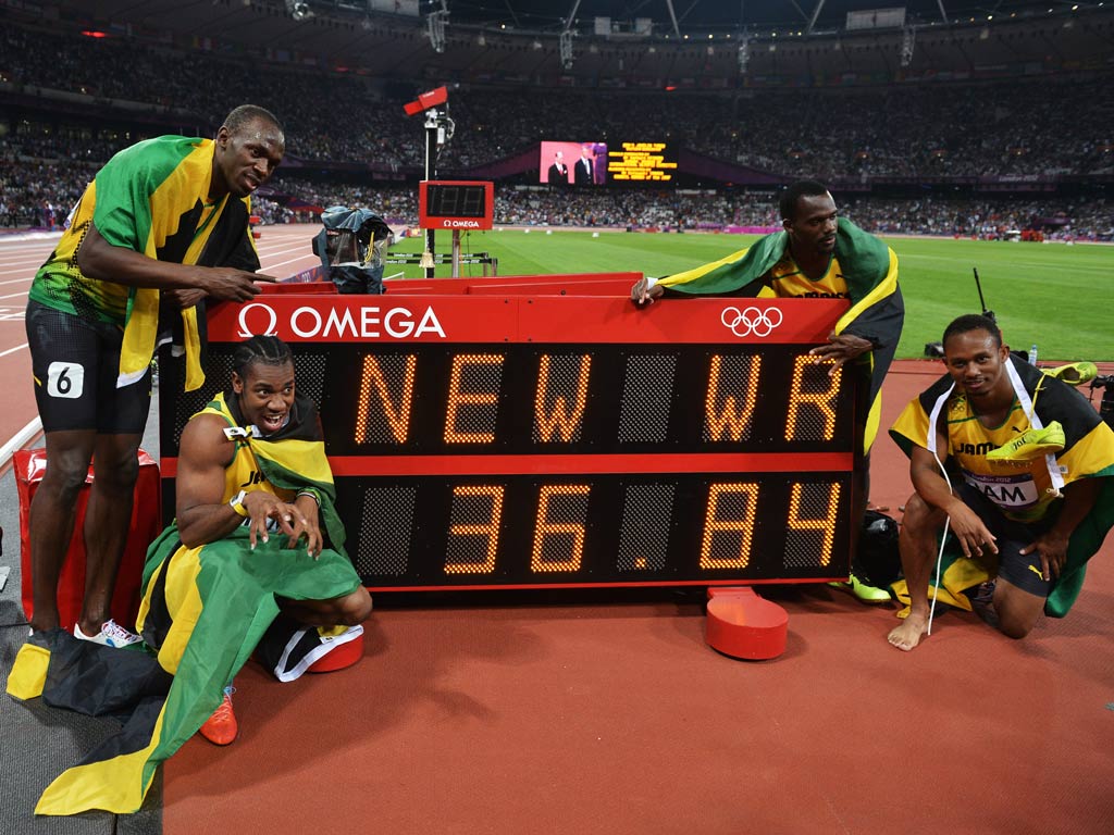 August 11, 2012: Usain Bolt and his Jamaican team-mates celebrate breaking the world record.