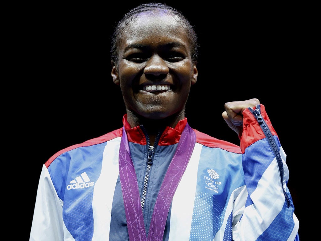 Prize fighter: Nicola Adams with her medal