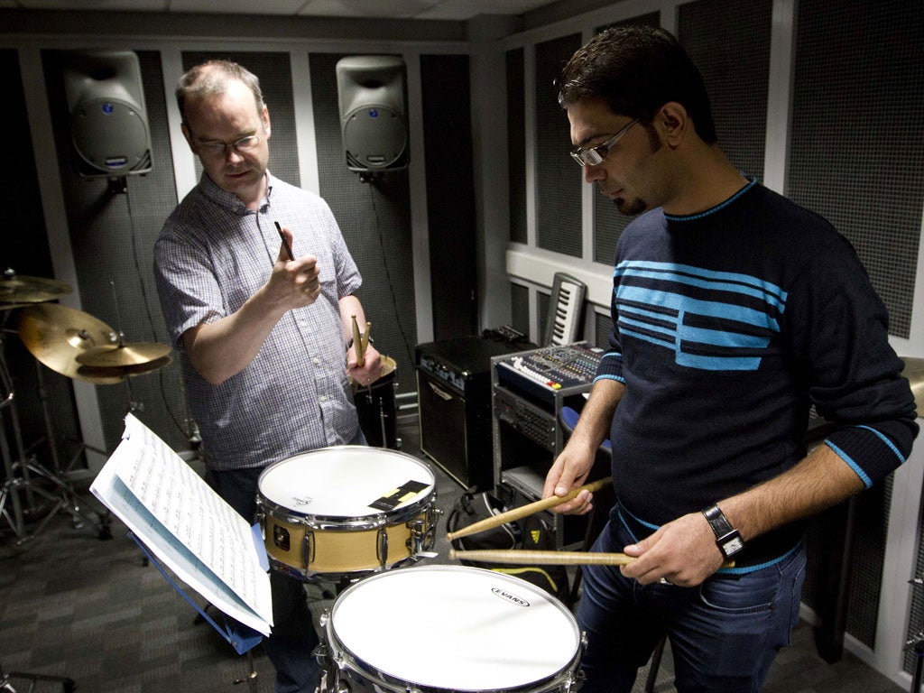 Orchestra members and tutors rehearse in Edinburgh ahead of their tour