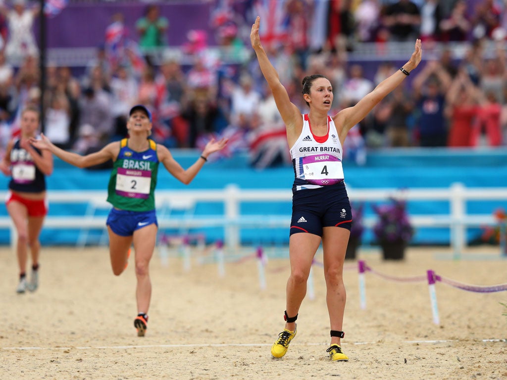 Samantha Murray celebrates winning Silver as she crosses the finish line during the Women's Modern Pentathlon on Day 16 of the London 2012 Olympic Games.
