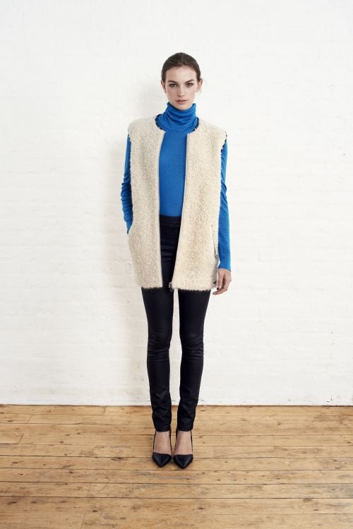 gilet £198, Maison Scotch; polo neck £115 and waxed jeans £130, Filippa K