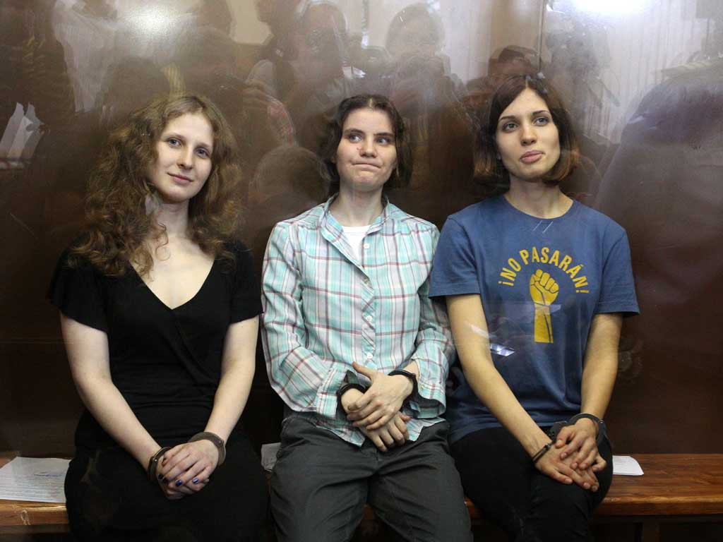 Members of the all-girl punk band 'Pussy Riot': Maria Alyokhina (left), Nadezhda Tolokonnikova (right) and Yekaterina Samutsevich