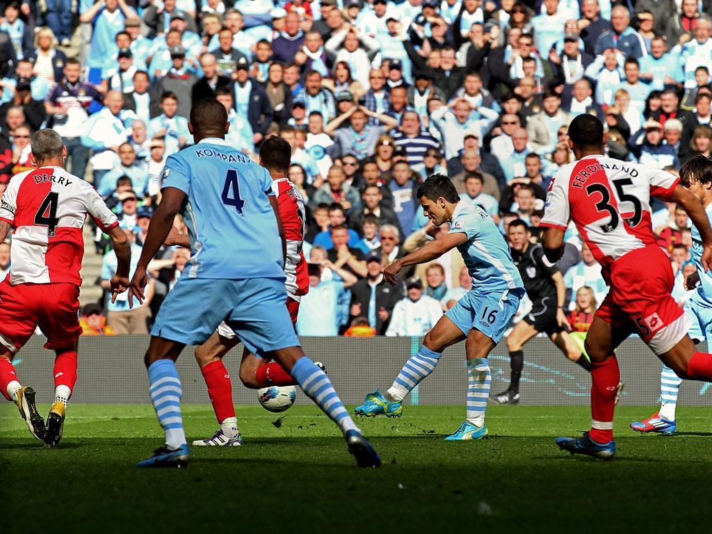 Sergio Aguero scores the goal that won City the league last season