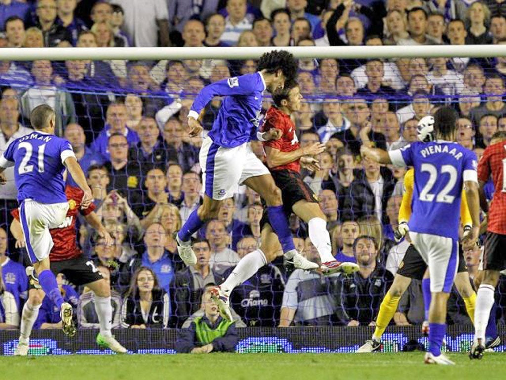 Marouane Fellaini rises high to head in Everton’s winner last night at Goodison