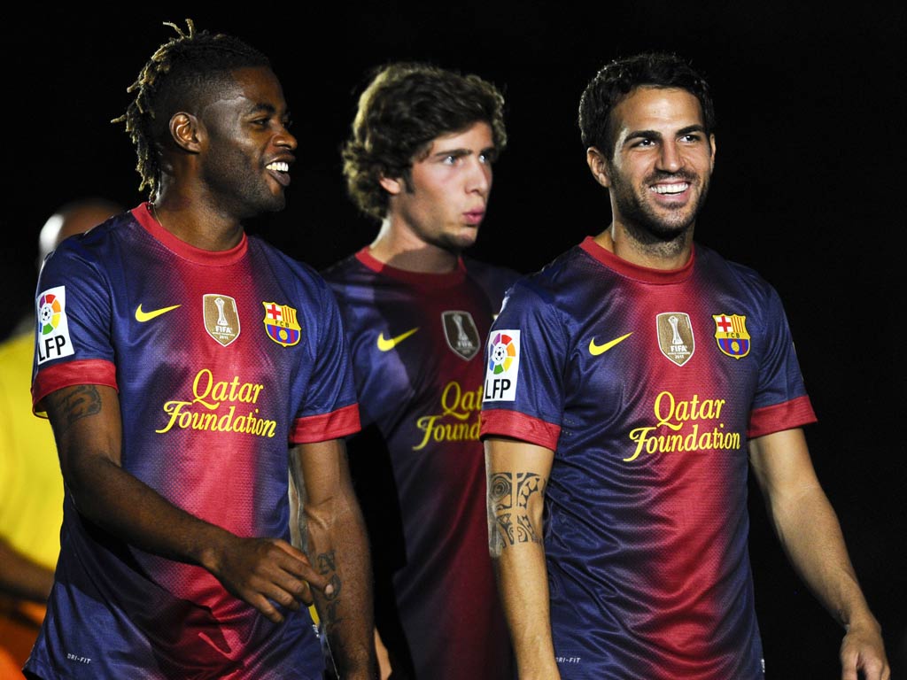 Alex Song with Cesc Fabregas at Barcelona