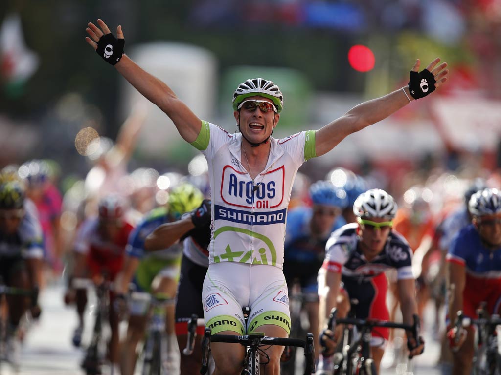 Jhon Degenkolb of Argos-Shimano celebrates as he crosses the finish line of the fifth stage