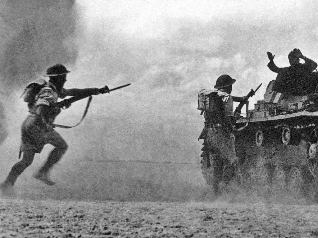 Battle of the sexes: a German soldier surrendering atop his tank during 'the battle at El Alamein' in 1942