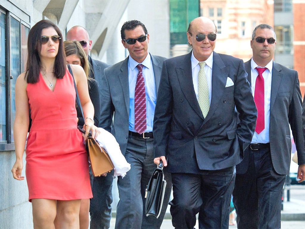 Asil Nadir arrives at the Old Bailey yesterday with his wife Nur, where he was convicted of 10 counts of theft