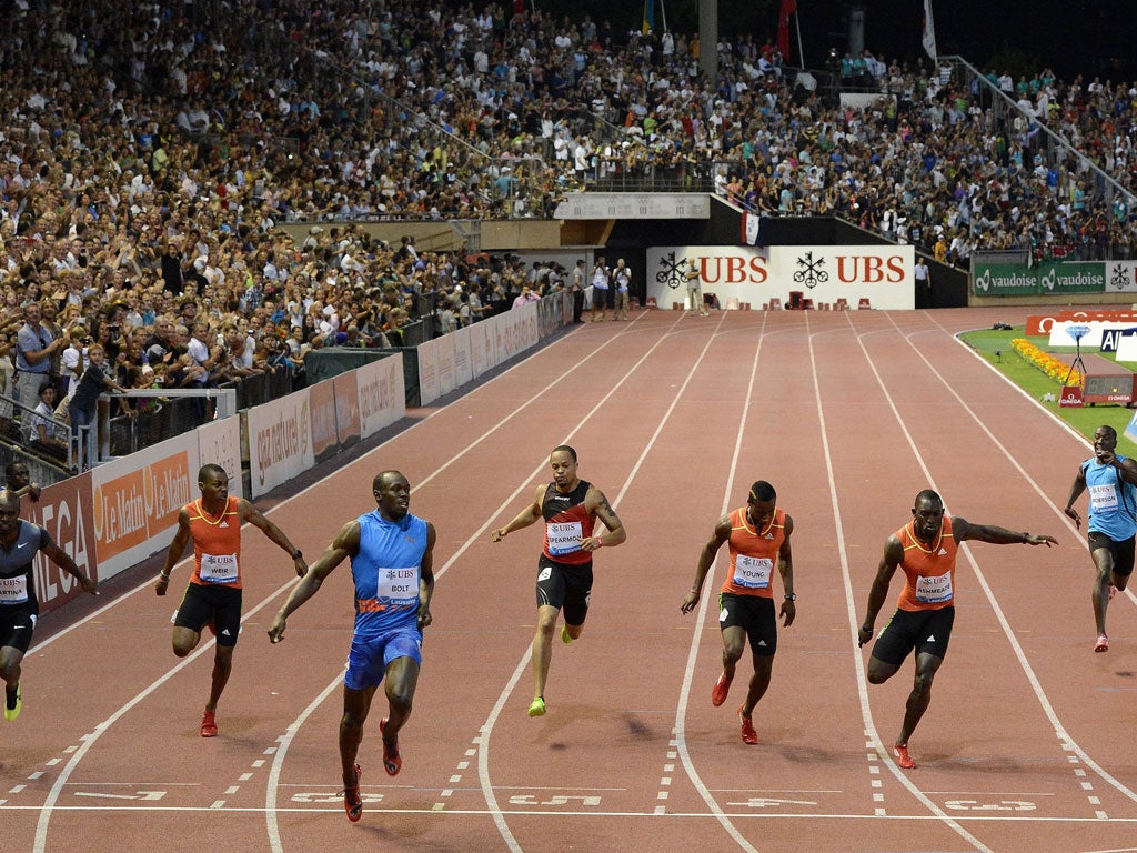 Usain Bolt, third from the left, wins the 200m in Lausanne last night