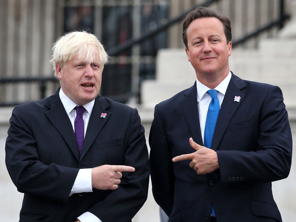 Boris Johnson and David Cameron attend the lighting of the Olympic cauldron in Trafalgar Square ahead of the start of the Paralympic Games