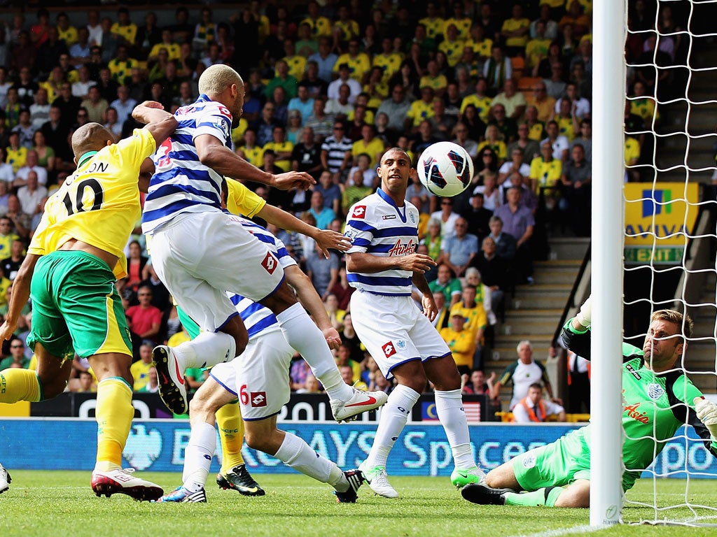 Norwich's Simeon Jackson heads the ball past Rob Green to score