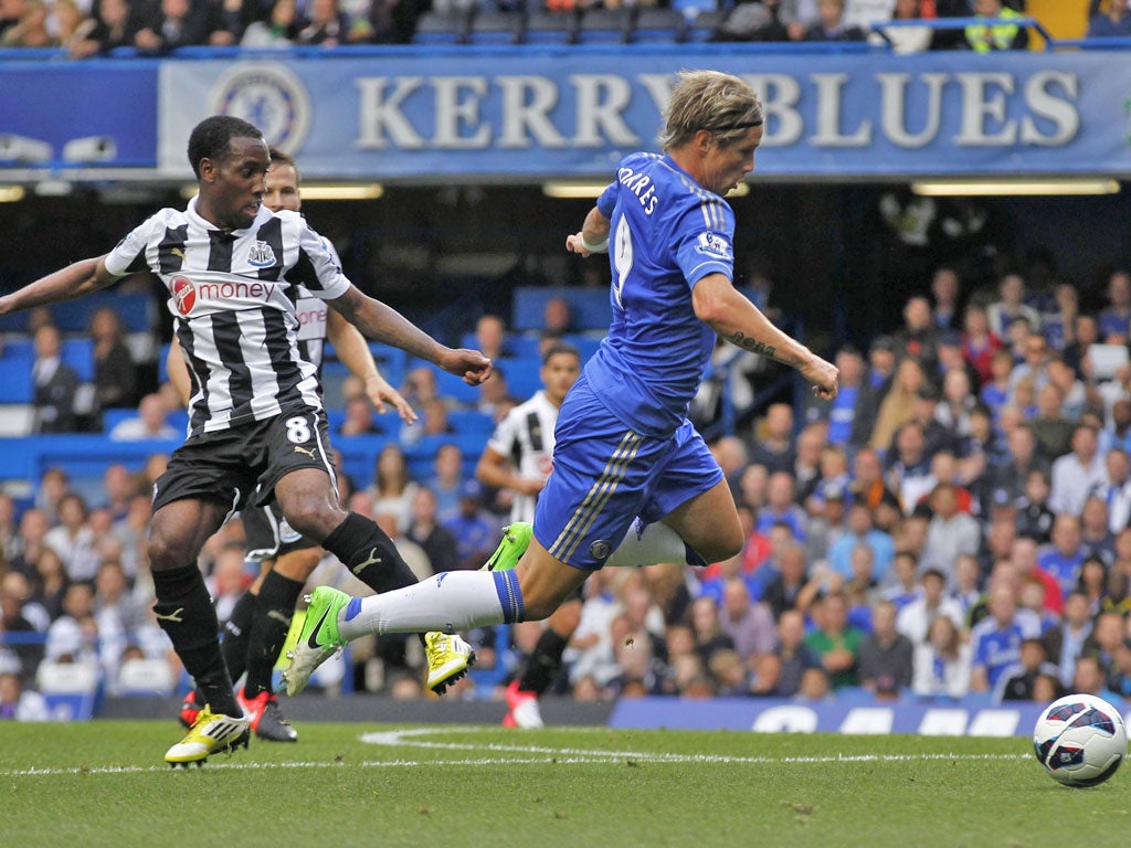 Vurnon Anita brings down Fernando Torres to concede penalty from which Chelsea took lead