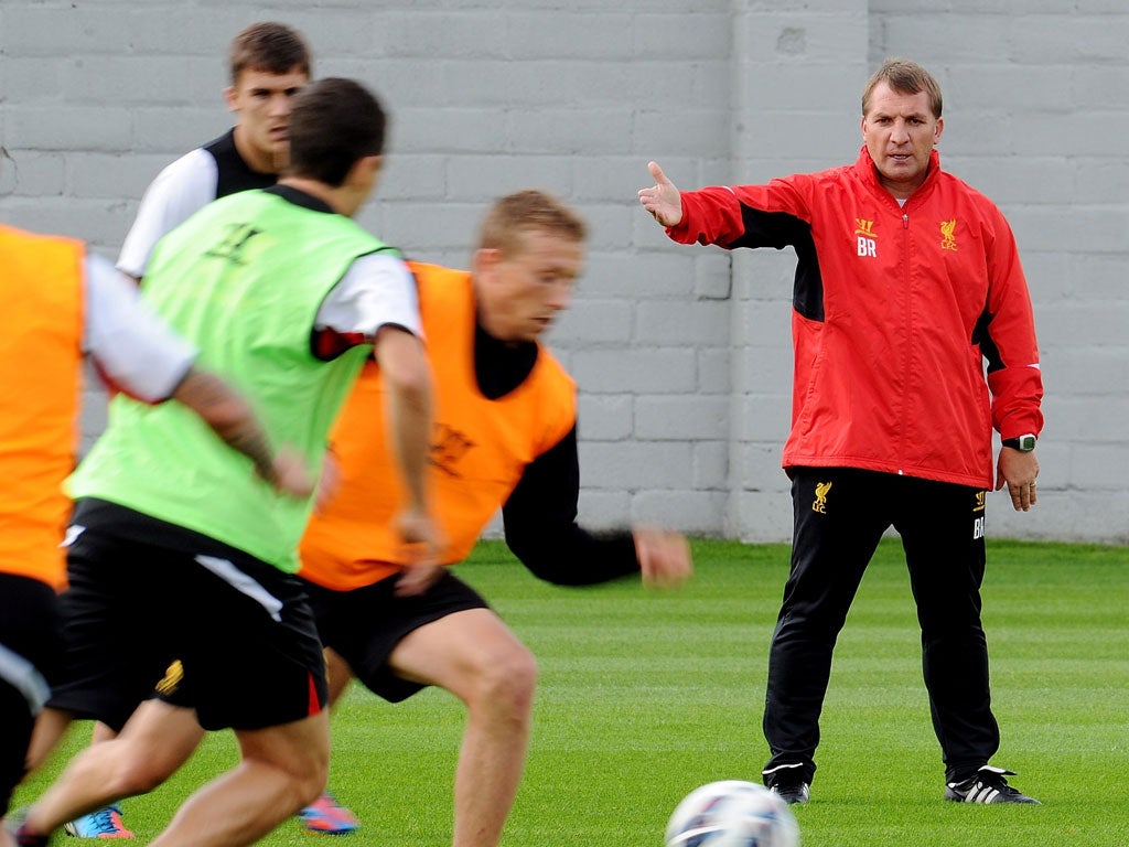 Stick to it: Brendan Rodgers will try to revive Liverpool's fortunes without betraying his belief in keeping possession