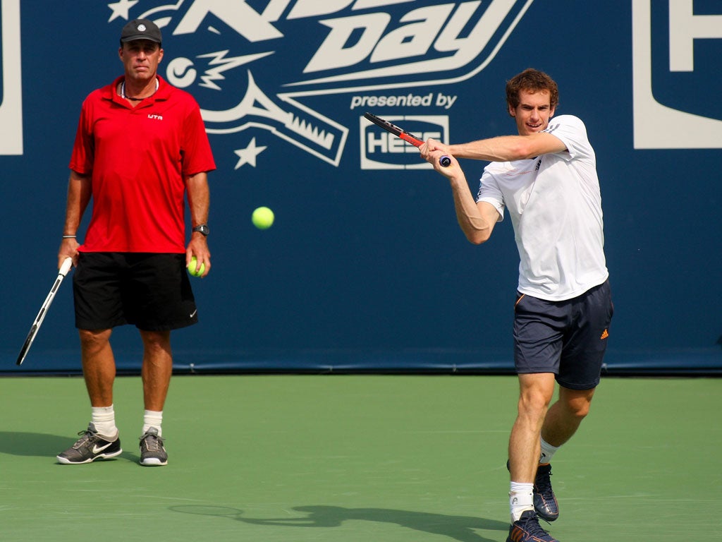 Murray is watched by coach Ivan Lendl