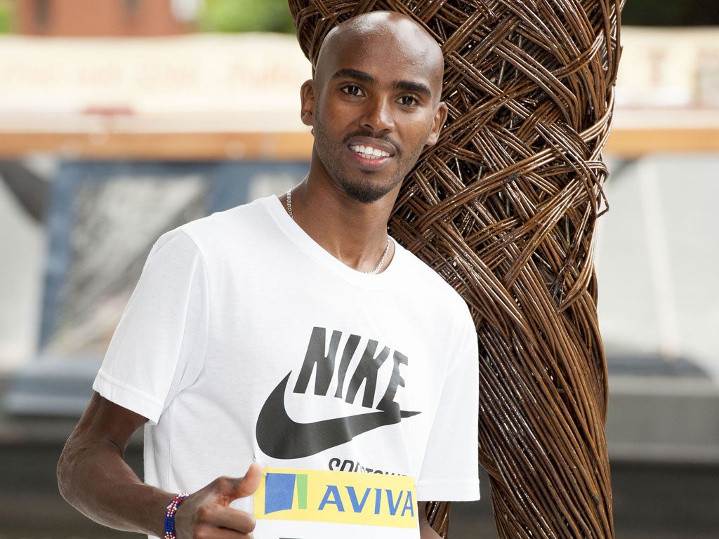 Proud new dad Mo Farah in Birmingham