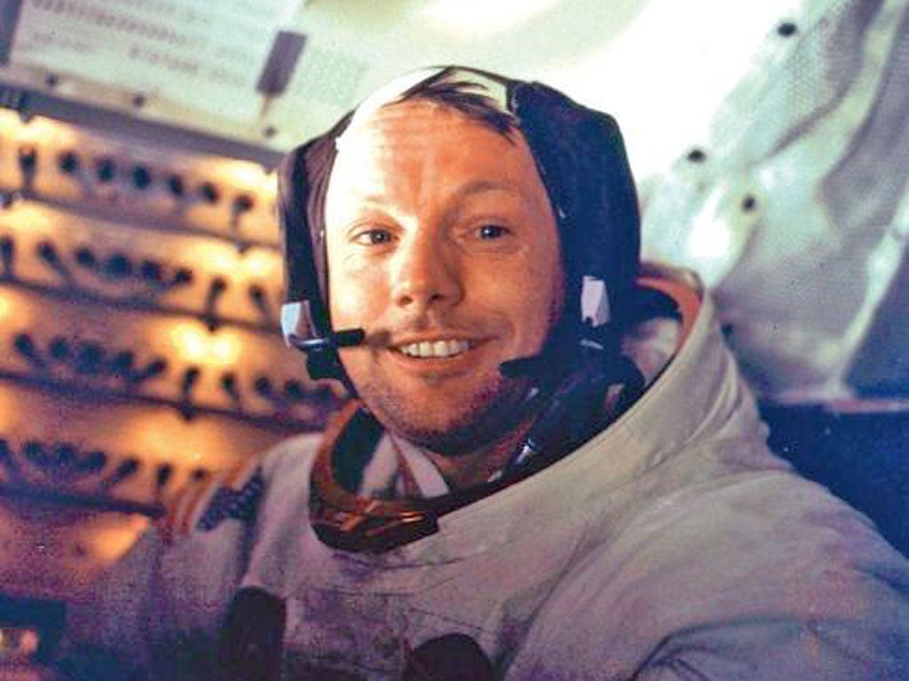 Neil Armstrong smiles into the camera after spending more than 2 hours on the lunar surface on 21 July, 1969