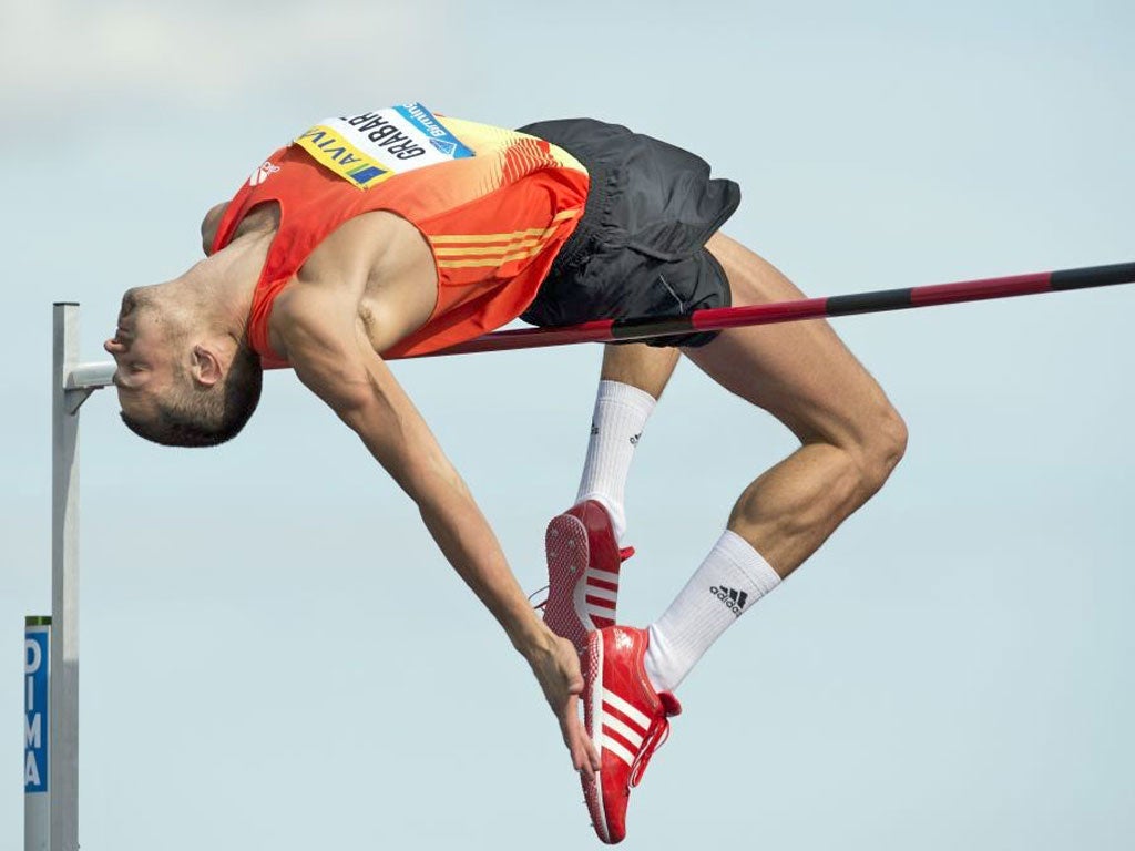 Robbie Grabarz soars to victory in Birmingham yesterday