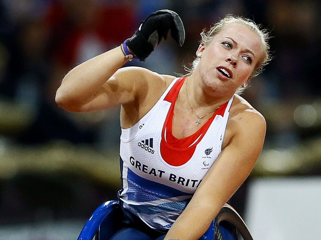 Hannah Cockroft celebrates winning the women's 100m T34 final