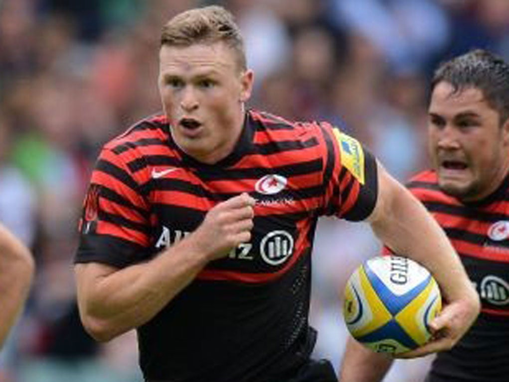 The getaway: Sarries’ Chris Ashton gives London Irish the runaround